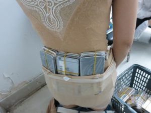 Smuggler Got Caught With 102 iPhones At The Hong Kong Airport Border Tucked Into Her Corset