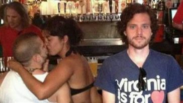 This Poor Guy Takes Pictures Of Himself Next To A Couple Making Out In Public It's Triumphant